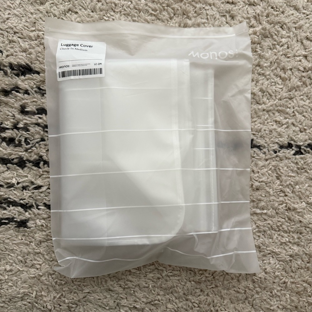 Monos Check-in Luggage Cover M